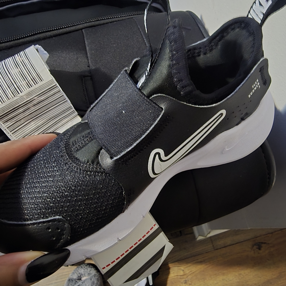 Nike Black and White Slip-On Sneakers